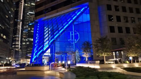 The JPMorgan Chase Tower in Houston, Texas, lit in blue at night