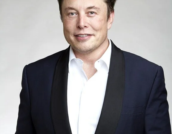 Elon Musk in a formal portrait