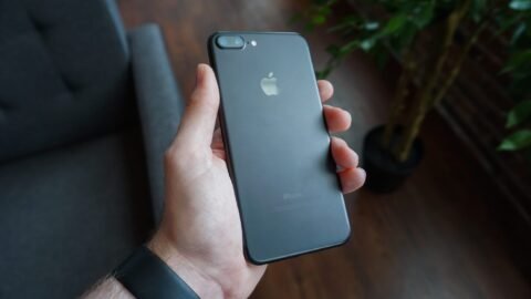 hand holding black smartphone social media mobile