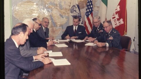 Illustrative photo: 541 Cameron reviewing contract documents - USACE-p15141coll5-15675 (Wikimedia Commons, Public domain)