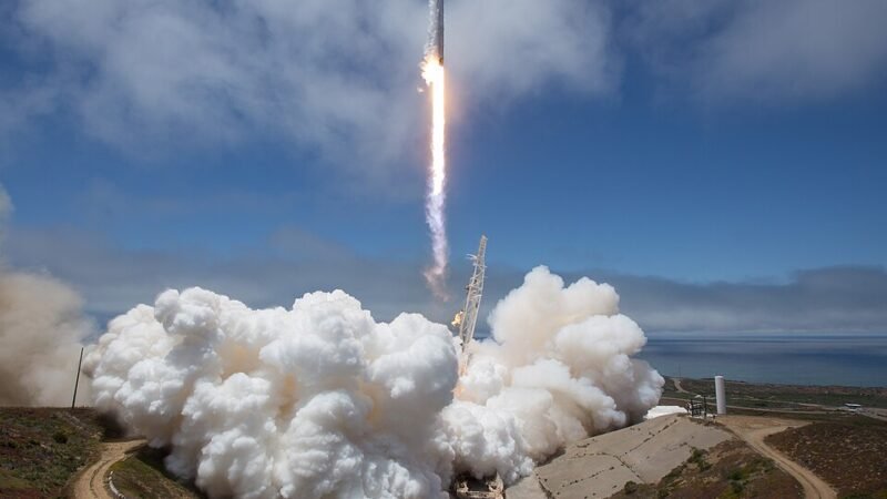 SpaceX Falcon 9 rocket lifting off with satellites aboard